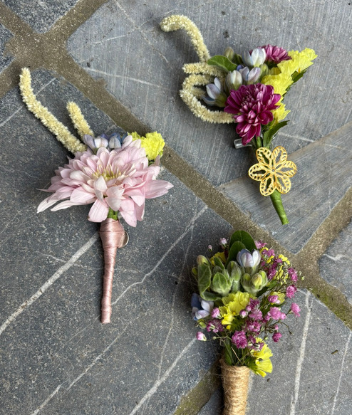 Drie corsages